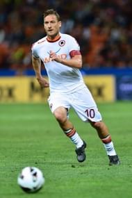 AS Roma's forward Francesco Totti runs for the ball in the match against AC Milan in Milan on May 12, 2013